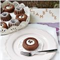 Ciambelle al cacao con ricotta e nocciole