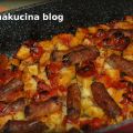 Patate e luganica al forno