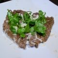 Fettine di manzo con rucola e grana