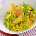 Risotto giallo con piselli e scampi