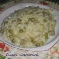 Risotto con salsiccia piselli e provola