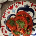 Pomodori conditi cotti in padella