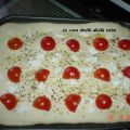 Pizza con pomodorini