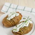 Hasselback potatoes and sour cream with chive.