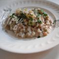 Farrorzotto con patate e carciofi in pentola a[...]