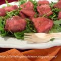 Fagottini di bresaola su letto di rucola