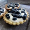 Tartelettes con crema di ricotta e mirtilli