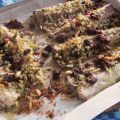 Sgombri con uvetta e pinoli