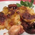 Tiella di polpo al forno con le patate.
